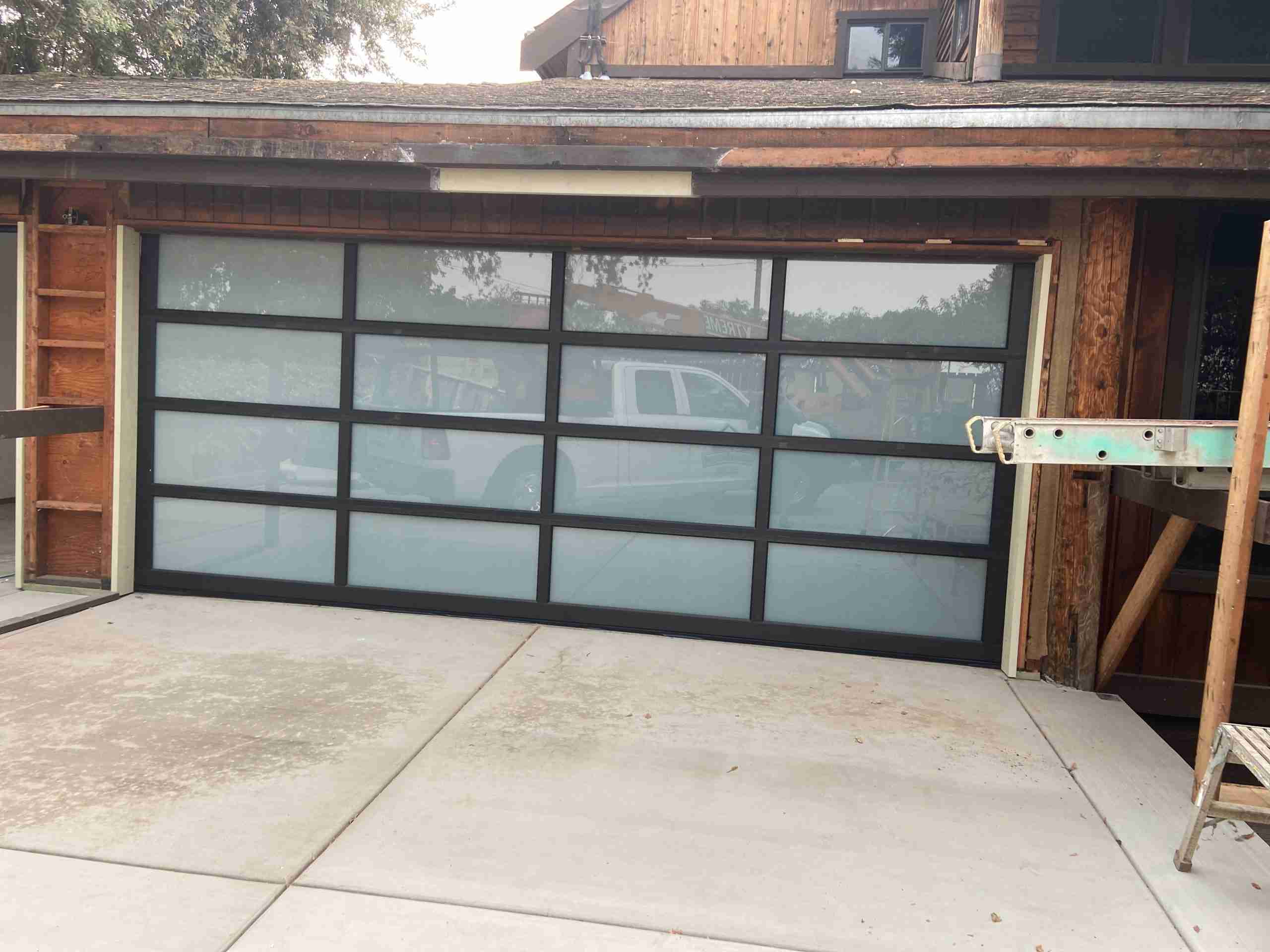1fc2e42e397e9146e8c2588e61681a4a Fullview Aluminum Garage Door With Black Aluminum Frame & White Laminate Glass