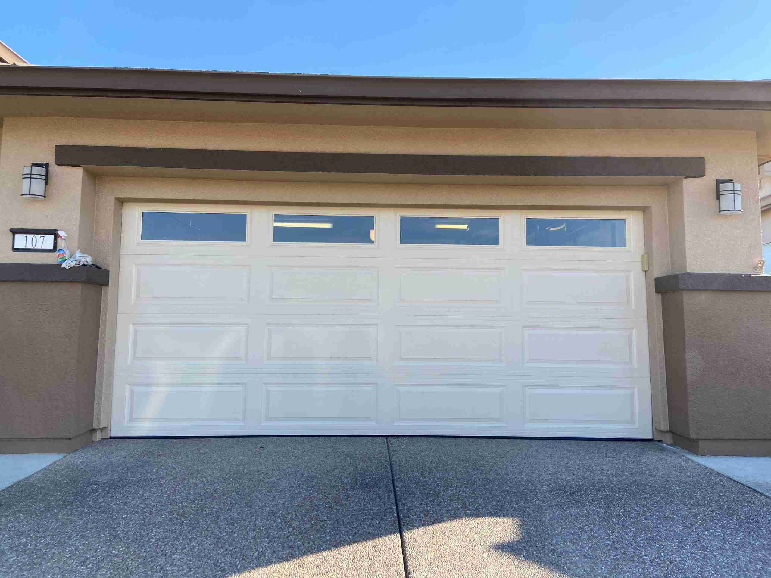426eff3490c71b2928349ddeb35fd272 CHI Long Panel Garage Door With Standard Color