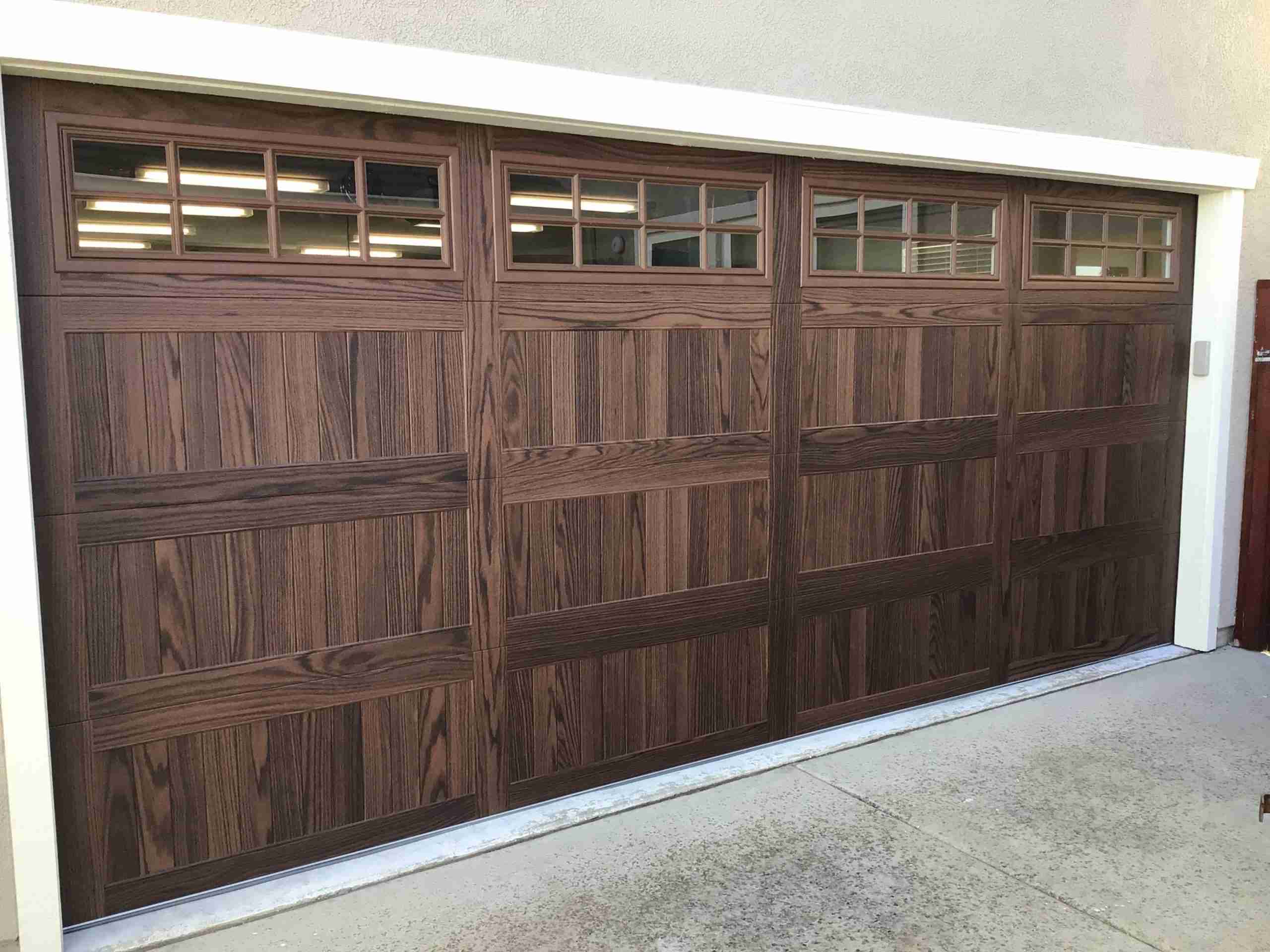 CHS LP, Dark Oak, Stockton CHI Overhead Garage Door Model 5950 With Woodtone Accent Color
