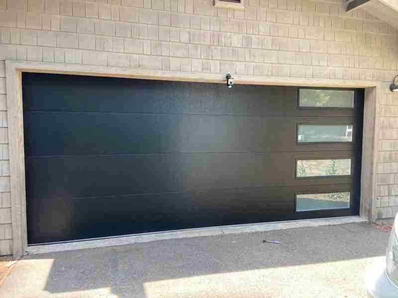 Flush Panel, Black, Frosted Glass Along Right Side CHI Overhead Garage Door Premium Color