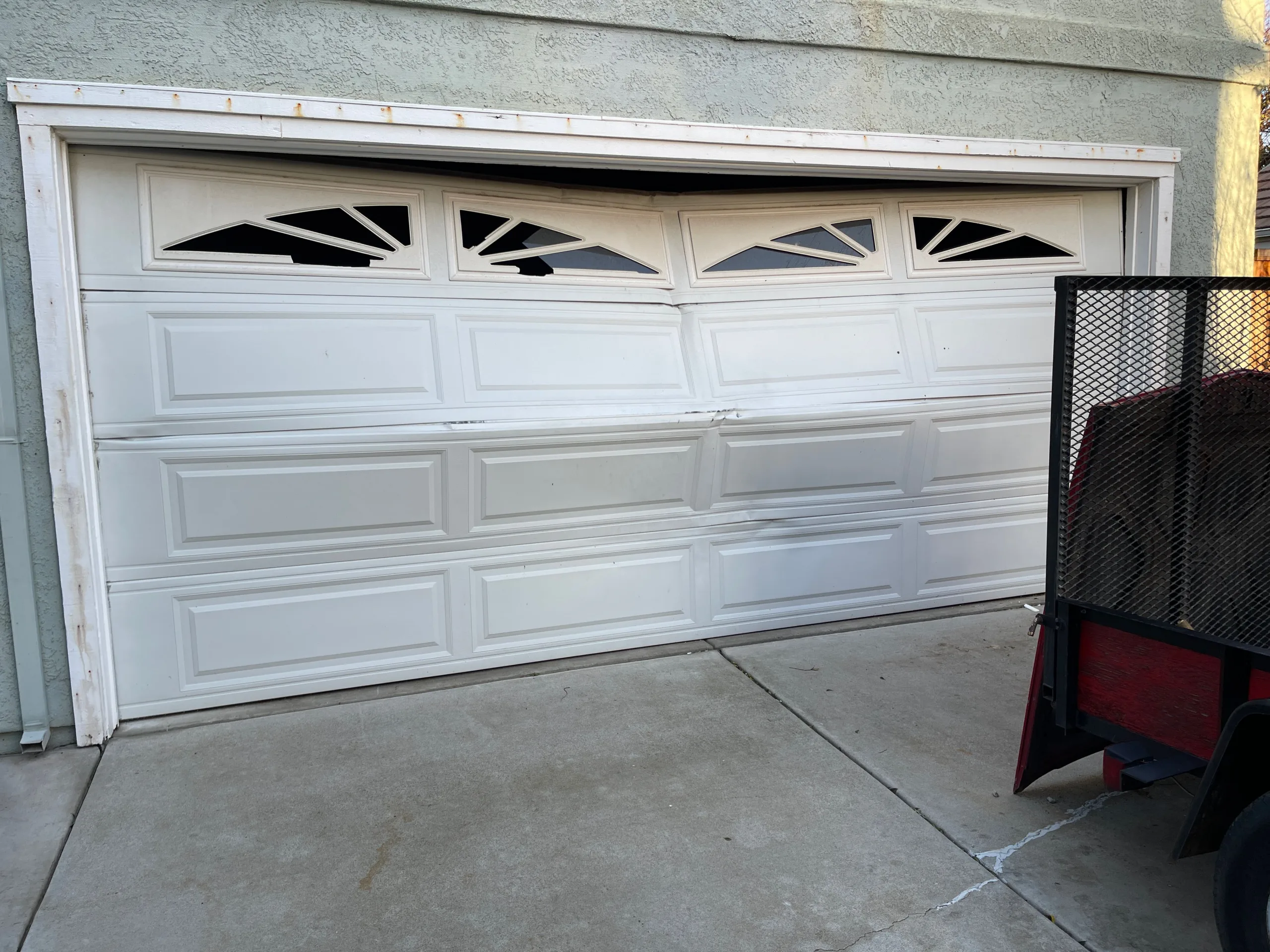 Local Garage Doors encounters destroyed garage door in Antelope, CA
