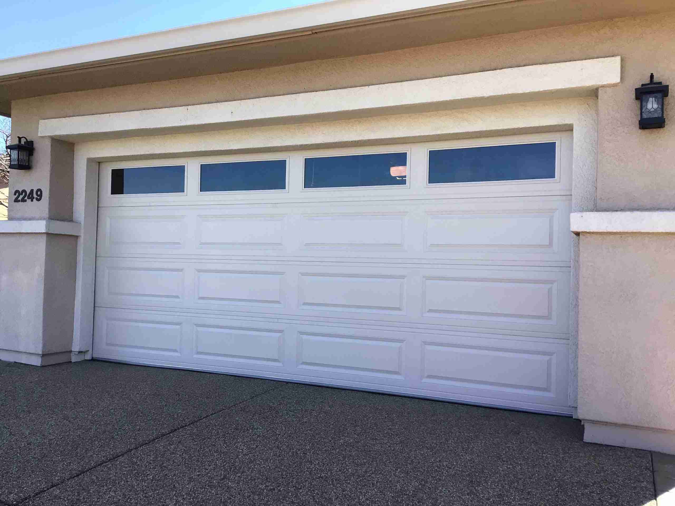 d09857626956629a618bc334f08f80ce CHI Long Panel Garage Door With Standard Color