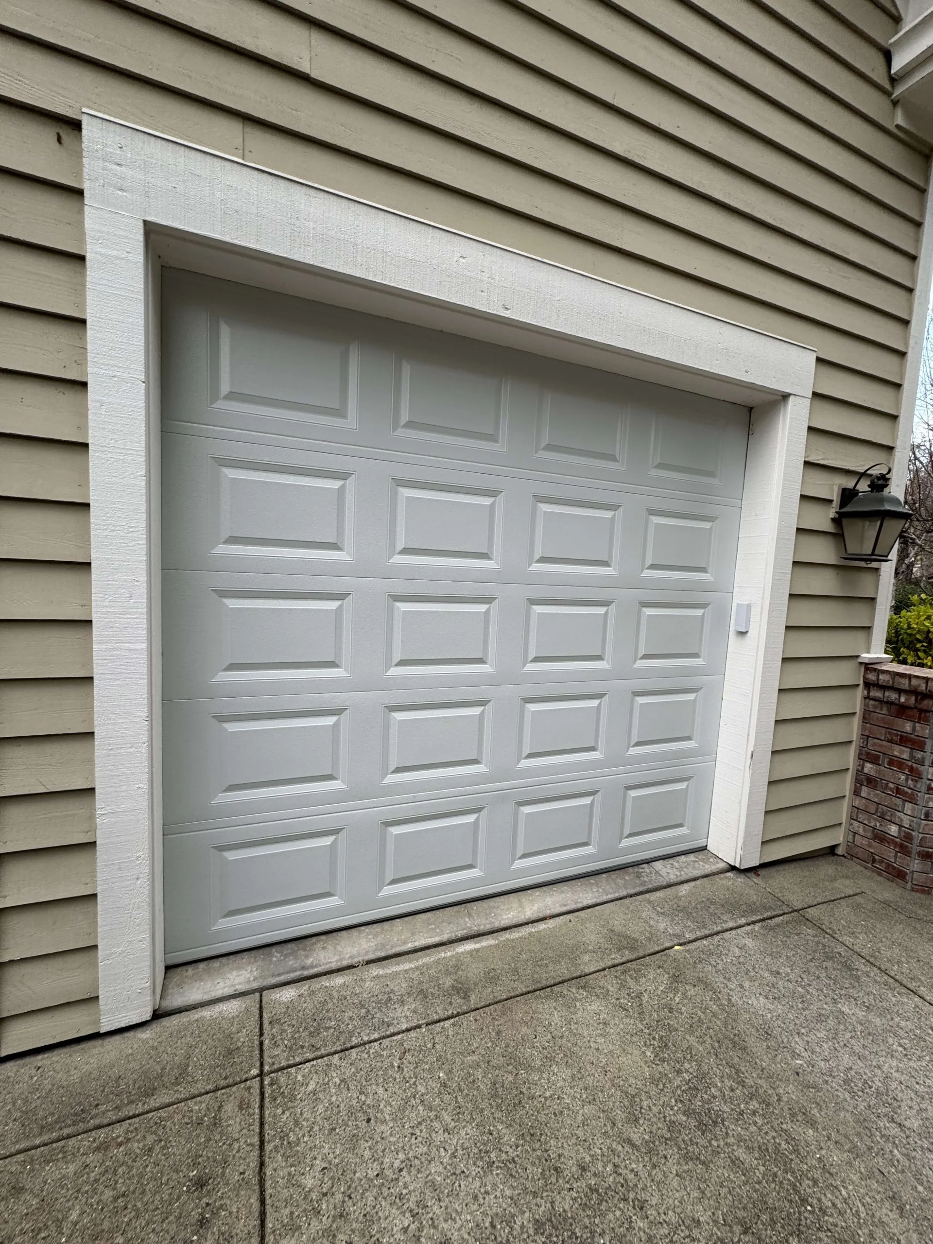 Local-Garage-Doors-installed-a-short-panel-garage-door-in-Tustin, CA_converted Garage door hinges installed on a residential garage door in Tustin, CA