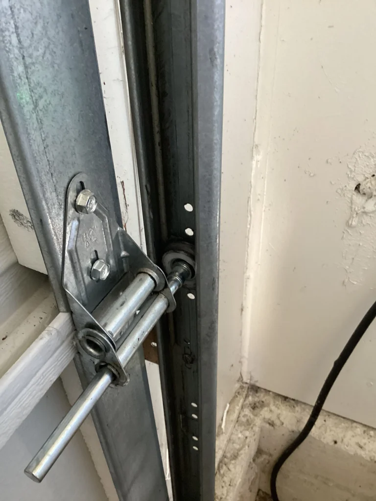 Heavy duty garage door rollers installed on a residential garage door in Villa Park, CA